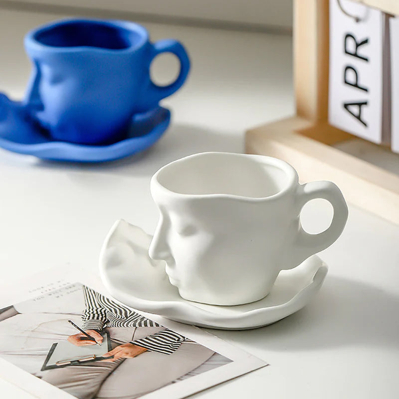 A creative coffee cup in the shape of a ceramic face