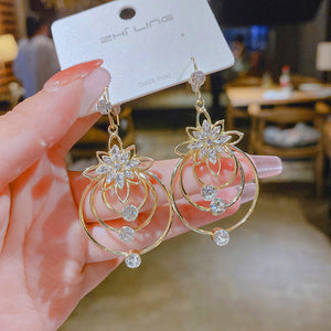 Three hoop crystal lotus earrings