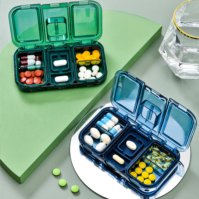 Pill box with a built-in cutter 