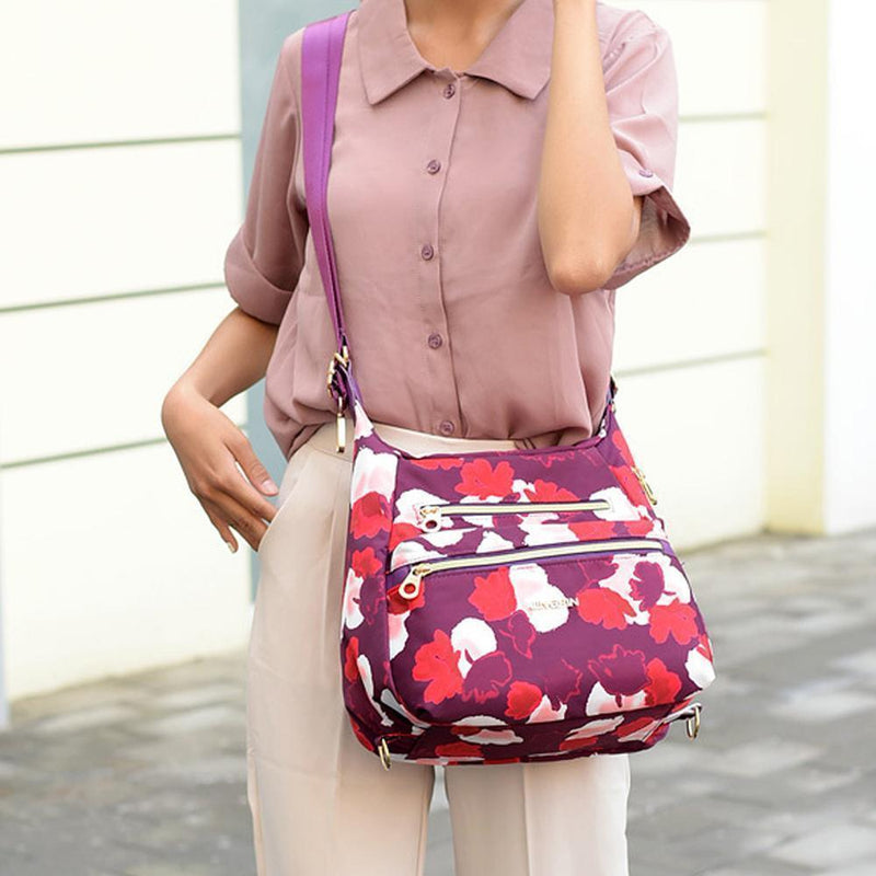 A bag with double zippers, a handbag and a shoulder bag 