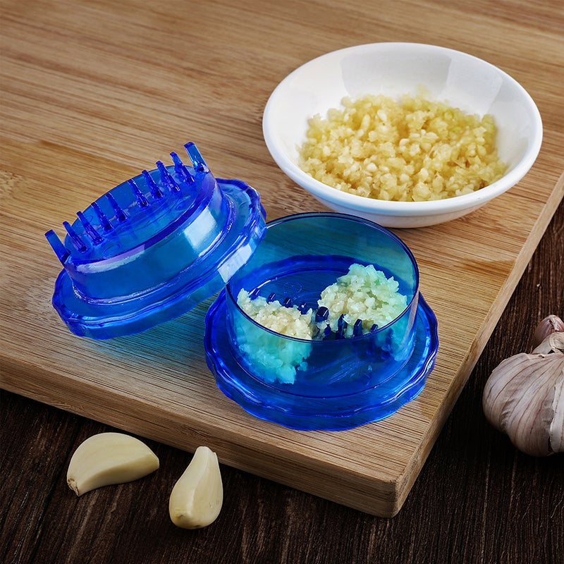 Mini manual garlic peeler