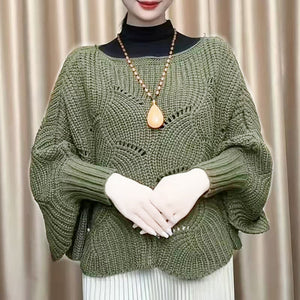 Knitted sweater with bat sleeves