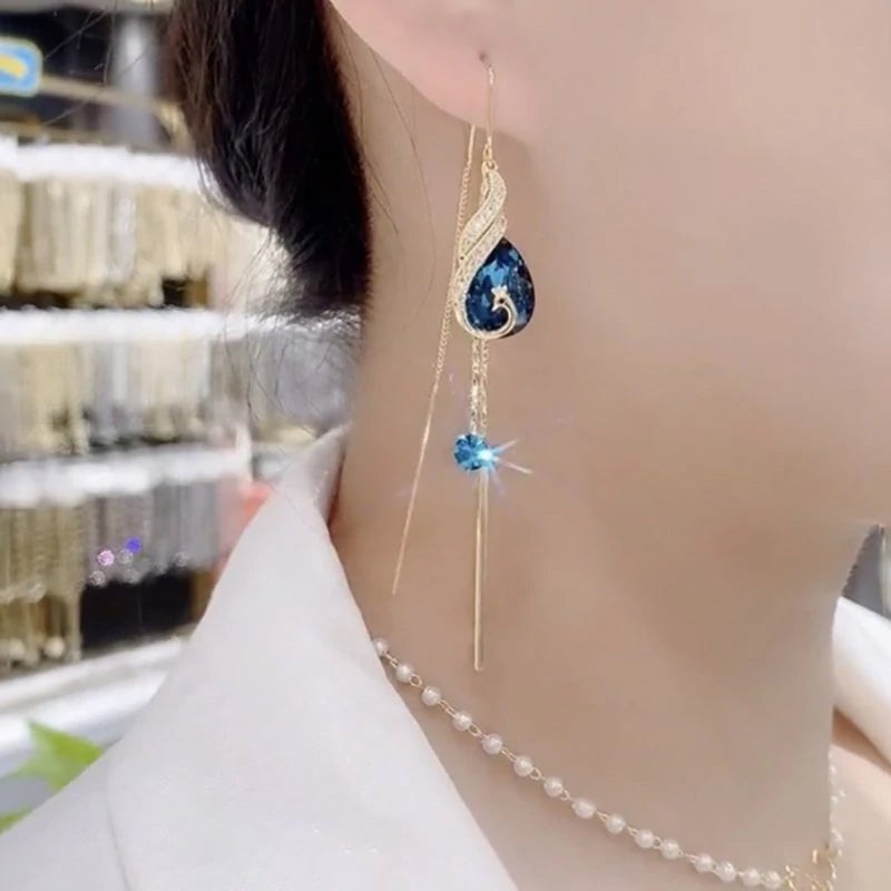 Elegant peacock earrings