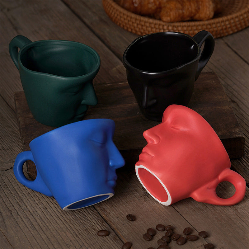 A creative coffee cup in the shape of a ceramic face