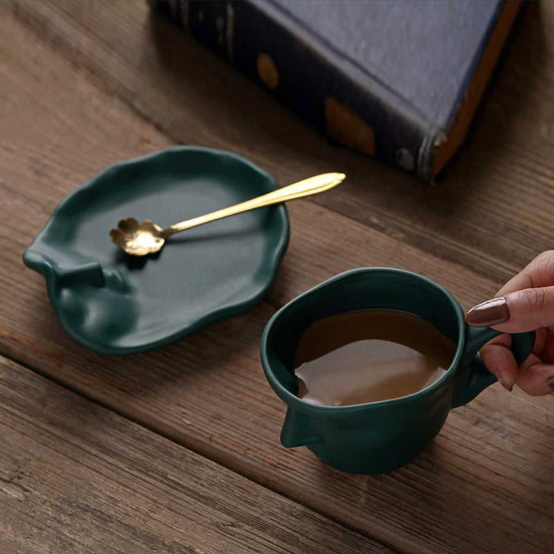 A creative coffee cup in the shape of a ceramic face