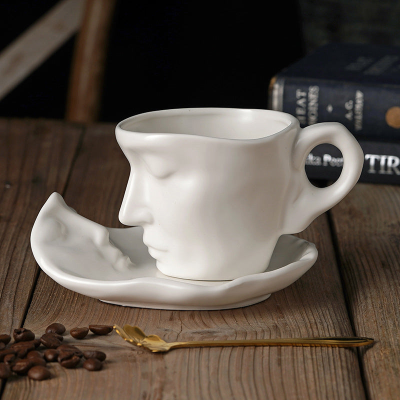 A creative coffee cup in the shape of a ceramic face