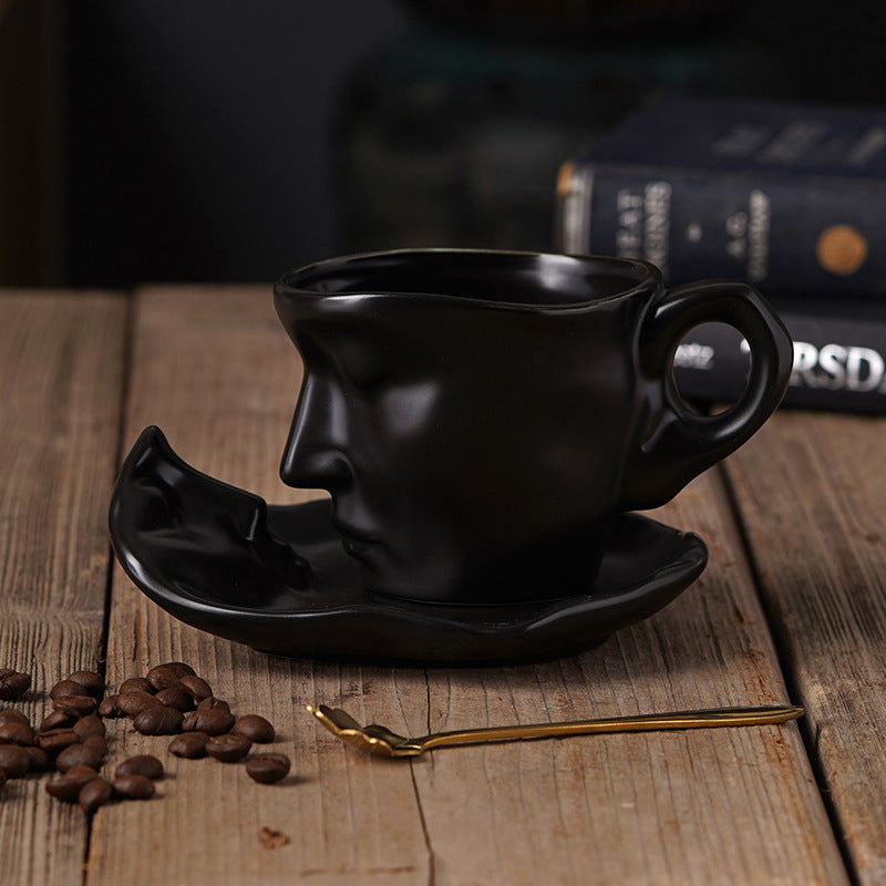 A creative coffee cup in the shape of a ceramic face